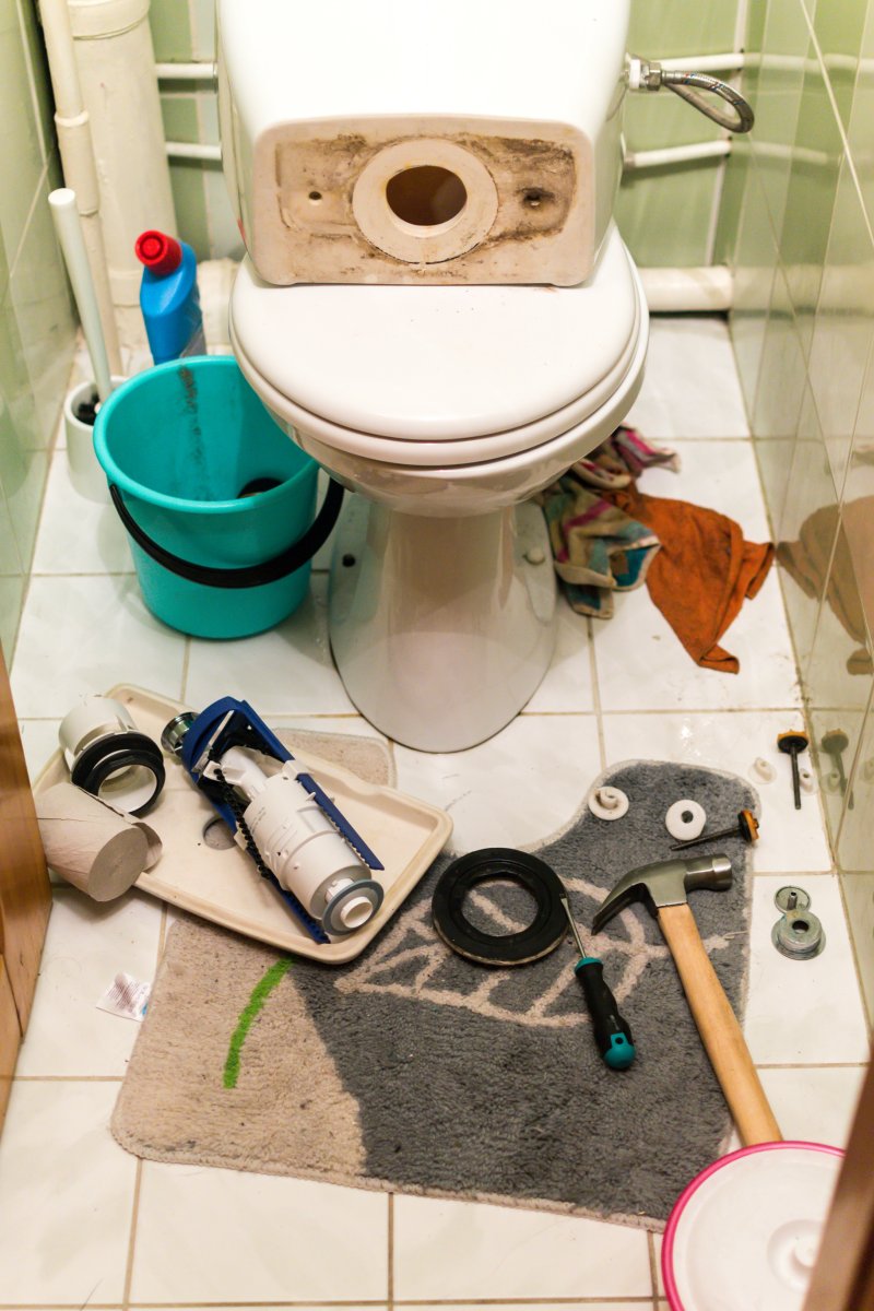 New toilet being installed in a South Kensington bathroom