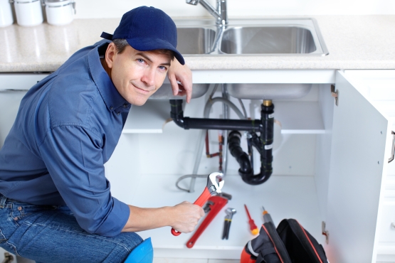 Decker Plumbing & Boiler Services team member at work